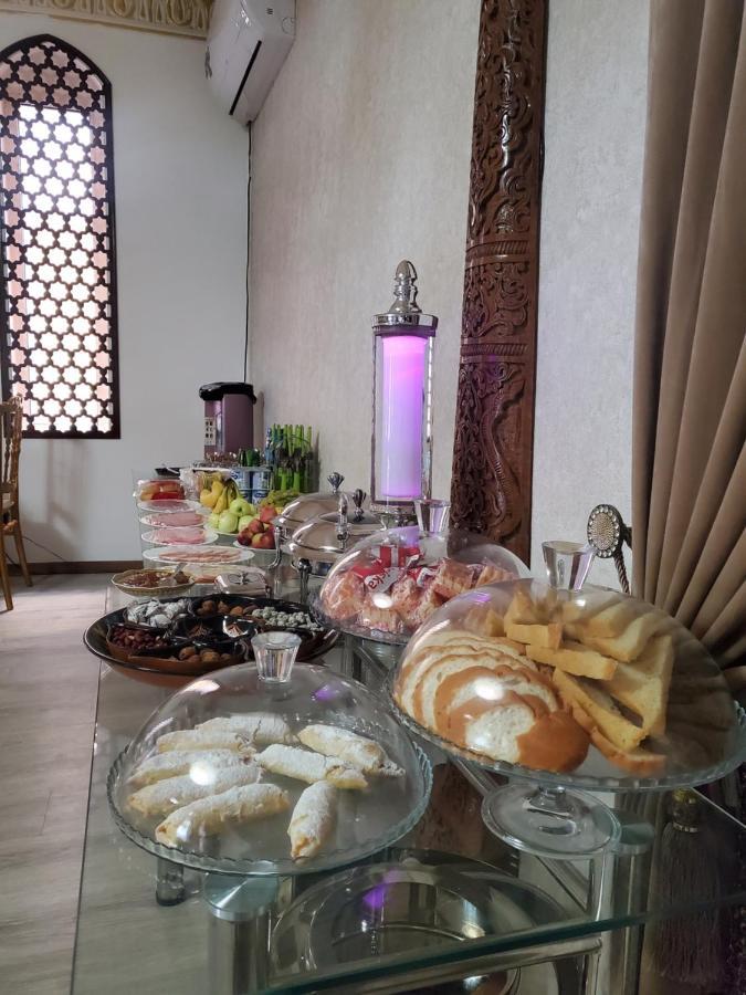Hotel Uzbegim อูร์เกนช์ ภายนอก รูปภาพ